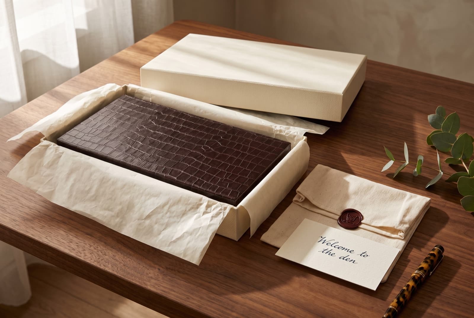 How it arrives: presentation box, tissue, dust bag and a wax-sealed card